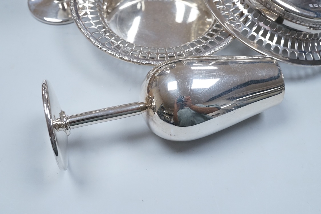 A pair of George VI silver bonbon dishes, by Davis, Duff & Son Birmingham, 1937, diameter 12.3cm, together with a set of six continental plated flutes.